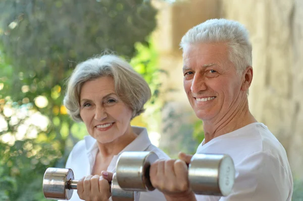 Happy fit senior couple exercising — Stock Photo, Image