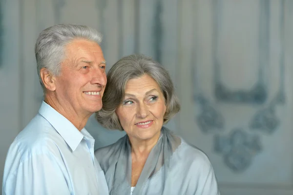 Elderly couple in vintage interior — Stock Photo, Image