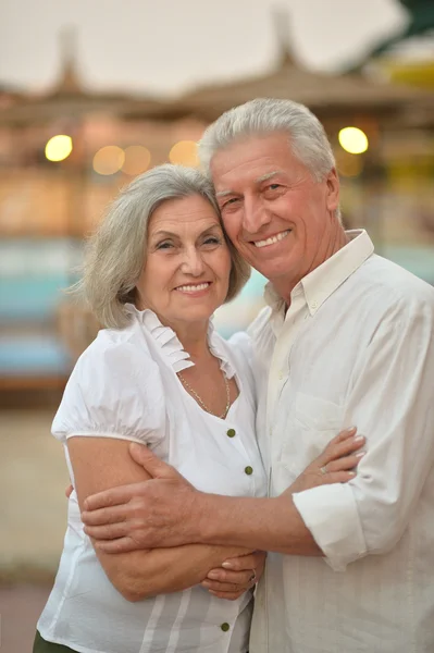 Senior couple near hotel resort — Stock Photo, Image