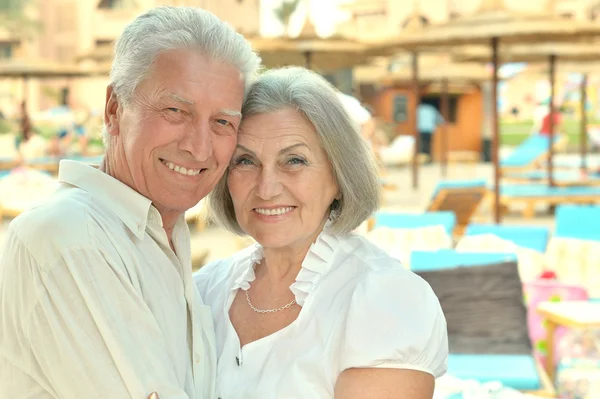 Senior couple near pool — Stock Photo, Image
