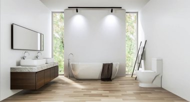 Boş beyaz duvar arkaplanı olan modern çağdaş banyo. Ahşap zeminli oda. Cam bir duş duvarı var. Doğaya tepeden bakan uzun pencereli
