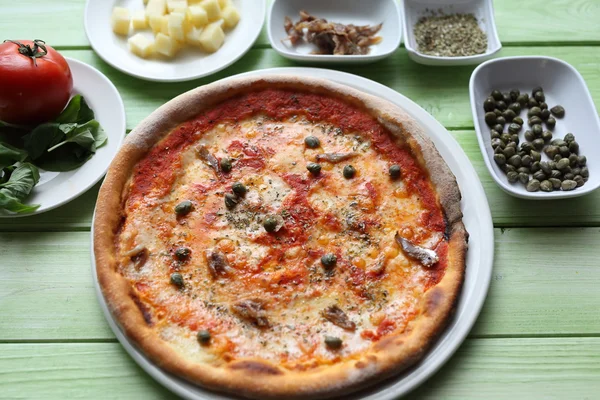 Pizza Napoletana with capers and anchovies — Stock Photo, Image