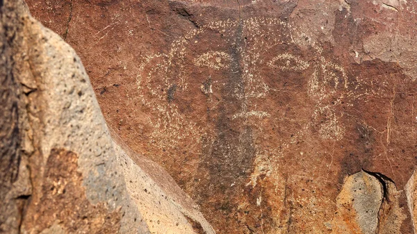 Petroglifo Cara en Tres Ríos Petroglifo sitio en Nuevo México, U —  Fotos de Stock