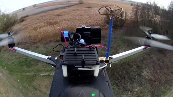 Drone, copter  films   motorcycle  team on  rural  road through camera with gimbal — Stock Video