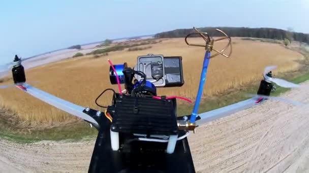 Drone, copter  films  going motorcycle on  rural  road through camera with gimbal — Stock Video