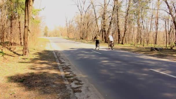 Two cyclists on the road — Stock Video