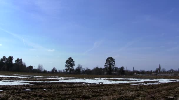 Veld en lucht in iwinter. Time-lapse — Stockvideo