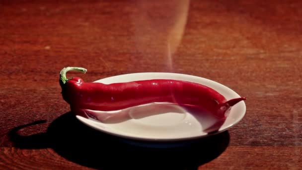 Pod de piment chaud sur le feu 