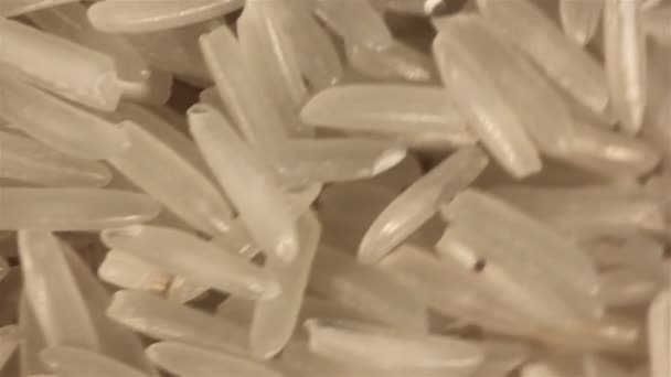 Arroz branco polido gira. Macro — Vídeo de Stock