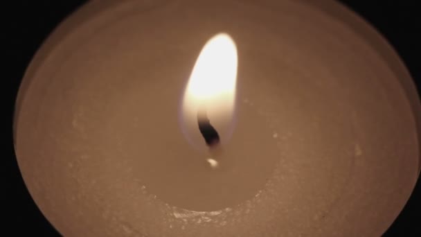 The tea candle turns. Top view — Stock Video