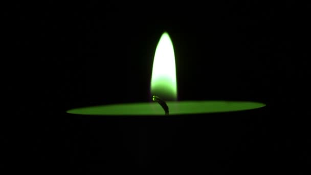 Abstract green flame of a candle in movement — Stock Video