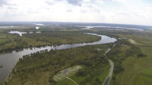 Slow Flight  over  river and fields . Aerial landscape panorama — Stockvideo