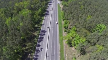 highway with cars  in sunny spring day. Aerial