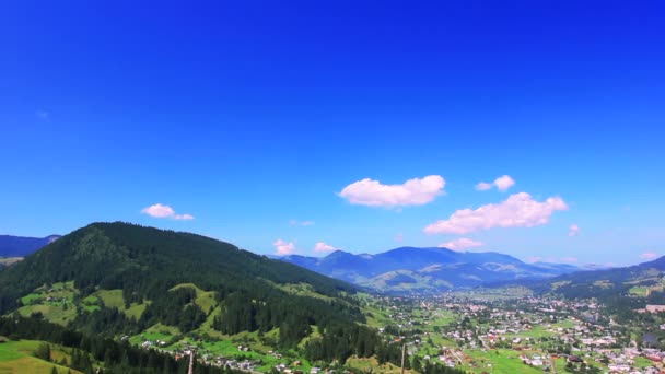 Mountain settlement and beautiful sky with clouds. Time lapse — Stock Video