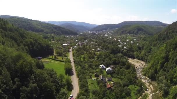 Valley in mountains with village. Aerial shot — Stock Video