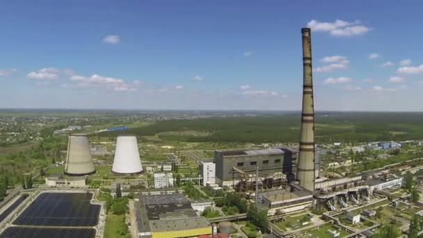 Up over Thermal power plant in  wood .Aerial — Stock Video