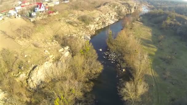 River in  village from height. Spring landscape. Aerial  view — Stock Video