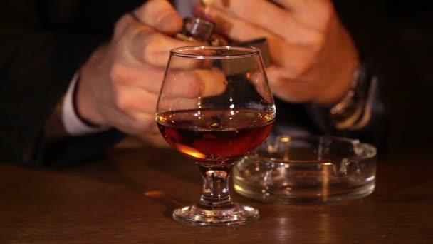 Man with  glass of cognac and  cigarette — Stock Video