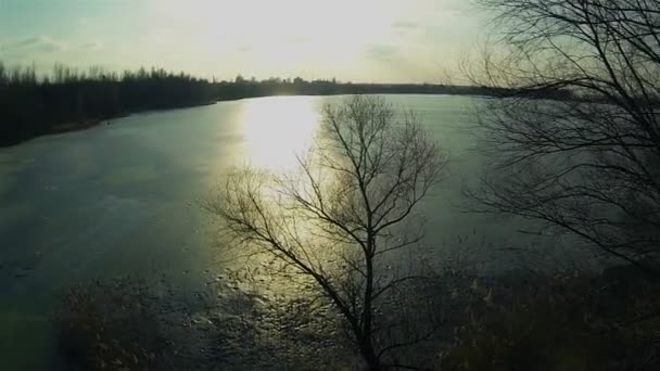 Puesta de sol en el lago congelado. Antena — Vídeo de stock