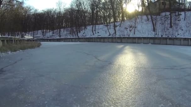 The frozen lake and sun . Aerial — Stock Video