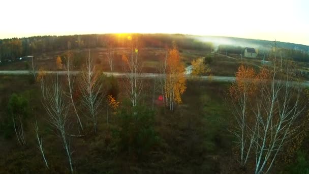 Hermosa puesta de sol en zonas rurales. Antena — Vídeos de Stock