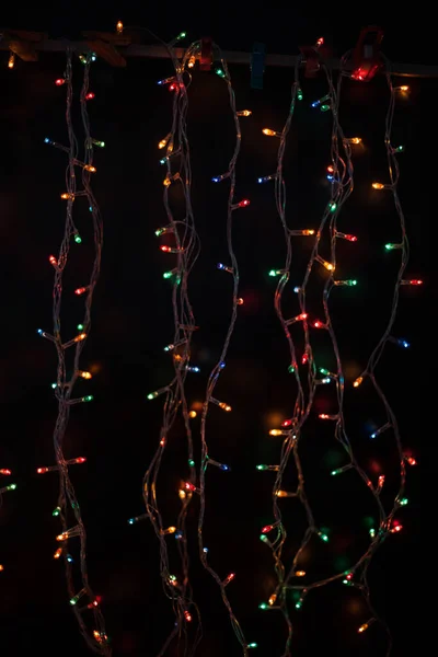 Bokeh Multicolor Sobre Fondo Negro Luces Multicolores Guirnalda Navidad Buen —  Fotos de Stock