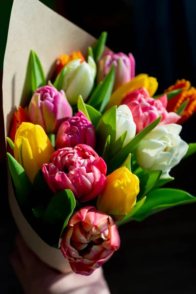 Bouquet of tulips. Flower delivery. Spring background . Tulip Copy space