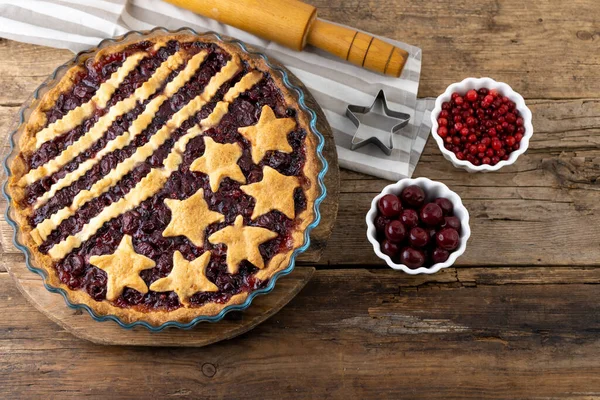 Step 4. After baking. Homemade cherry pie. Cake from dough with stars. Food for 4th July USA Independence Day. American Pie. Sweet pastries. Berry tart. DIY. Step by step instruction