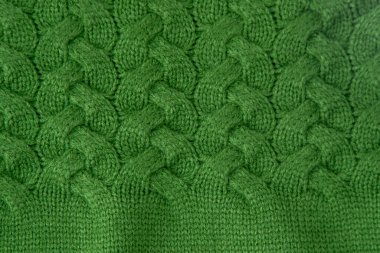Yeşil Kablo Örgü Kumaş yün süveter arka planı.