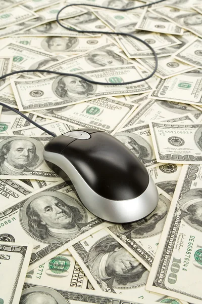 Dólares americanos e mouse de computador — Fotografia de Stock