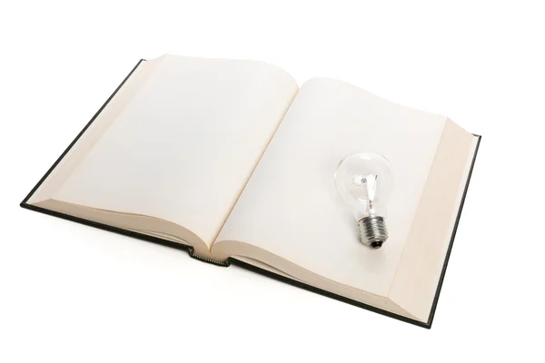 Livro e lâmpada — Fotografia de Stock