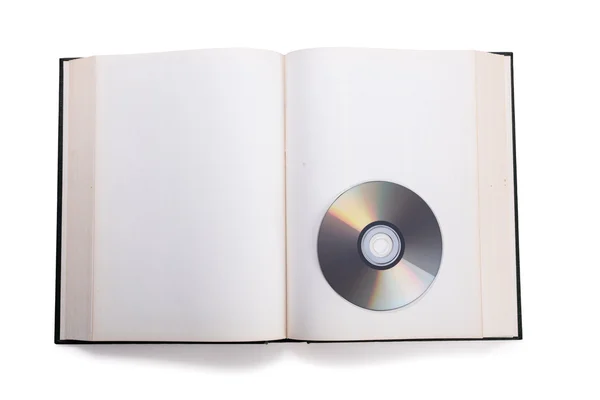 Livro aberto e disco compacto — Fotografia de Stock