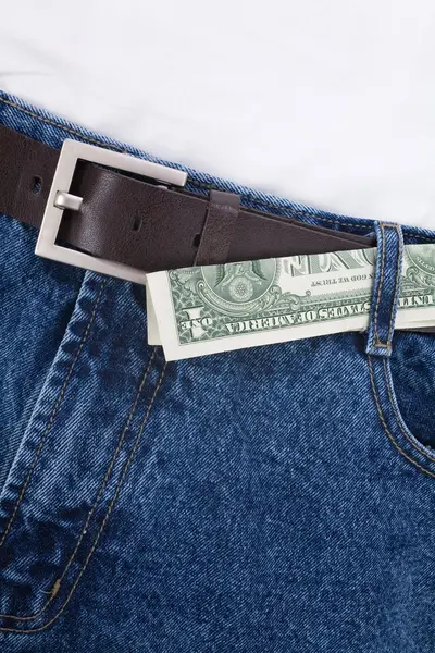 Jean azul e dólares — Fotografia de Stock