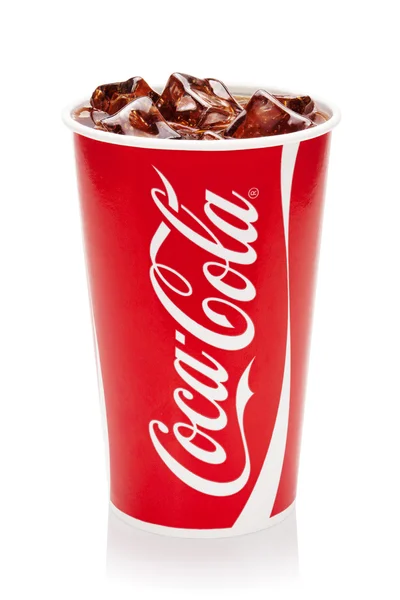 Coca-Cola with ice cubes in original cup. — Stock Photo, Image