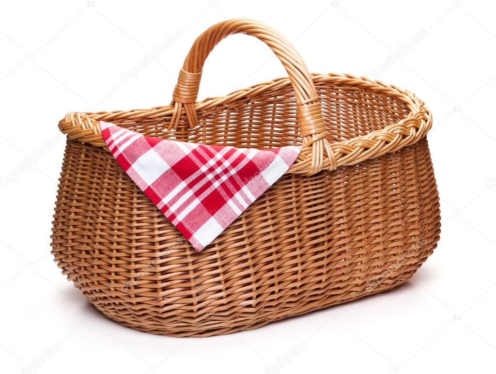 Wicker picnic basket with red checked napkin. Stock Photo by ©jurisam