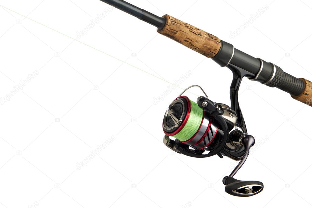 Fishing tackle isolated on white. Spinning reel close up.