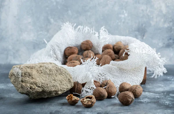 A basket full of healthy raw walnuts — Stock Photo, Image
