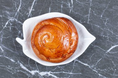 Lezzetli çörekler, mermer arka planda. Yüksek kalite fotoğraf