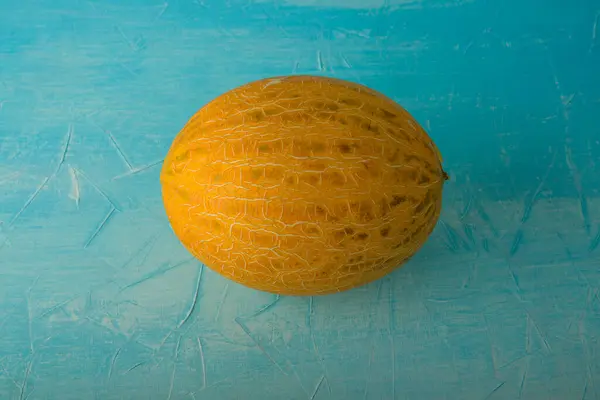 Melon Jaune Sur Fond Bleu Photo Haute Qualité — Photo