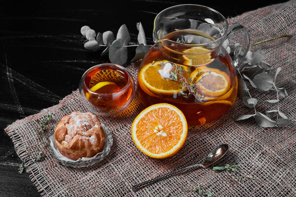 Puff pastry with lemonade on black background. High quality photo