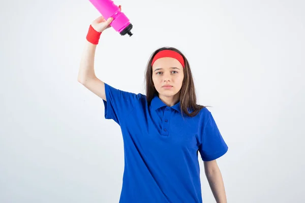 Foto Una Joven Deportista Sosteniendo Una Botella Agua Rosa Foto —  Fotos de Stock