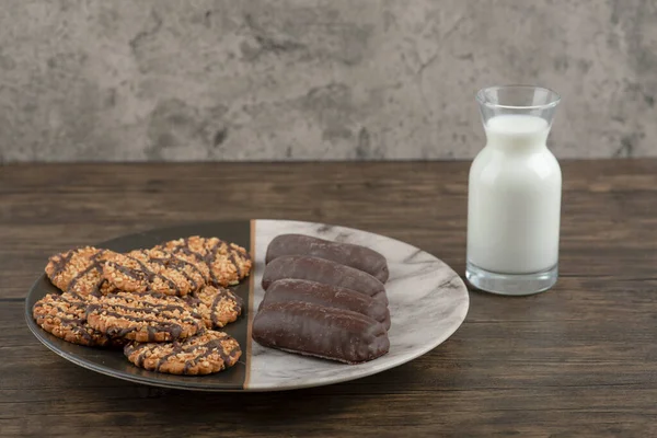 Plate Full Cookies Chocolate Cakes Fresh Milk Wooden Surface High — Fotografia de Stock