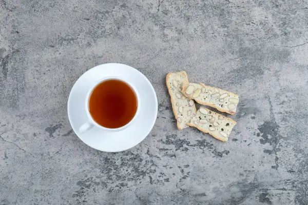 Sliced Whole Grain Bread Nuts Cup Hot Tea Placed Stone — Stock Photo, Image