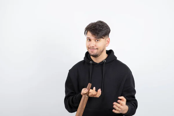 Homem Segurando Rolo Mão Contra Fundo Branco Foto Alta Qualidade — Fotografia de Stock