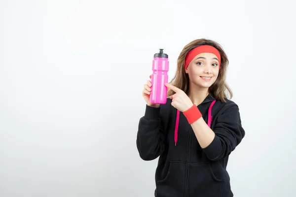 Beautiful Sporty Woman Pointing Bottle Water White Wall High Quality — Stock Photo, Image