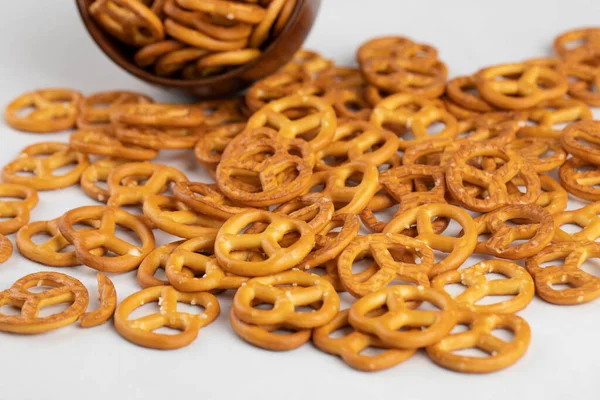 Wooden Bowl Salty Dry Pretzels Crackers Placed White Background High — Stock Photo, Image