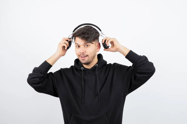 Handsome Young Man Black Hoodie Wearing Big Wireless Music Headphones — Stock Photo, Image