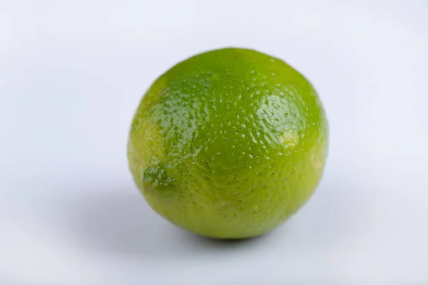 One Whole Fresh Lime Isolated White Background High Quality Photo — Stock Photo, Image