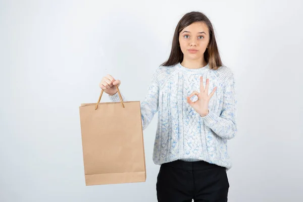 Photo Teen Girl Sweater Holding Craft Bag Giving Sign High — Stock Photo, Image