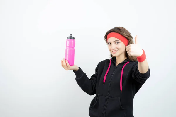 Beautiful Sporty Woman Holding Bottle Water Showing Thumb High Quality — Stock Photo, Image